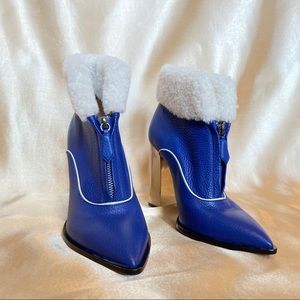 Never worn blue leather booties w teddy accents